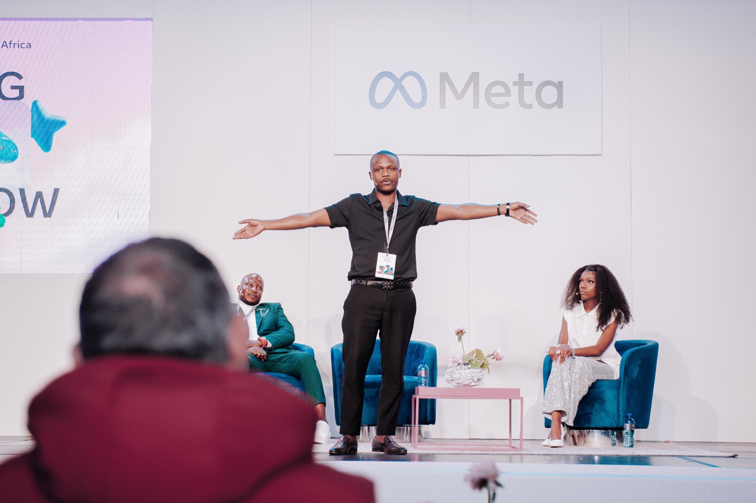 Ndivhuwo Muhanelwa speaking on stage at Meta Africa